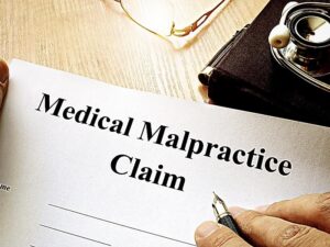 Medical Malpractice Claim on a table