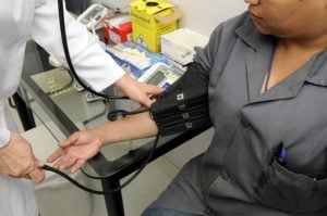Doctor is diagnosing a patient