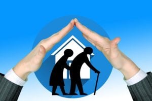 Hands protecting seniors at nursing home