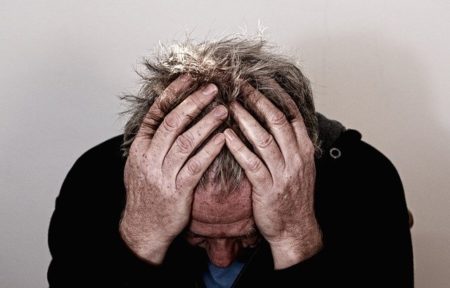 A senior feels a serious headache
